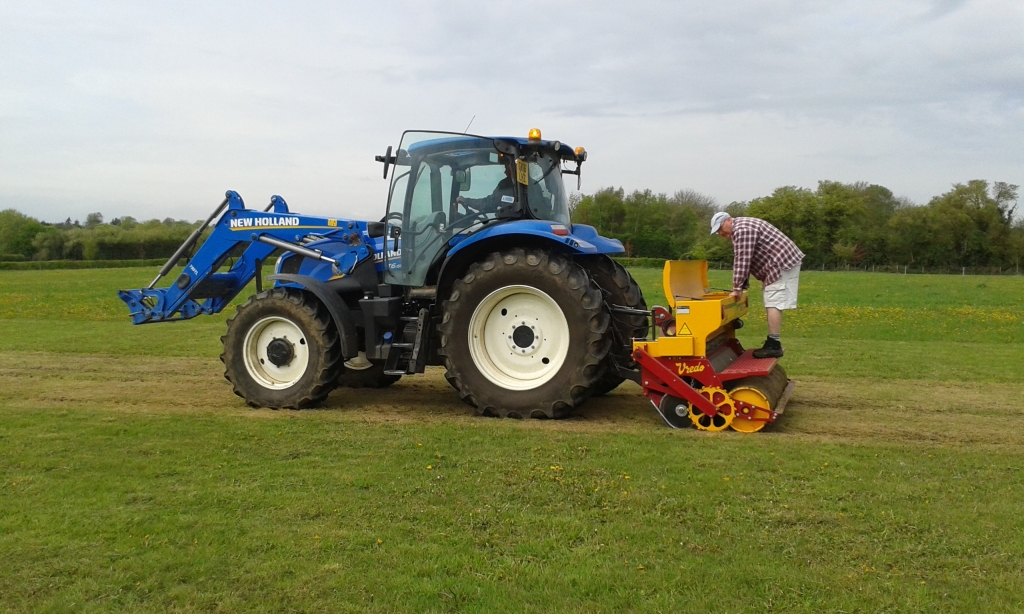 Ben checking the seed hopper before commencement of drilling