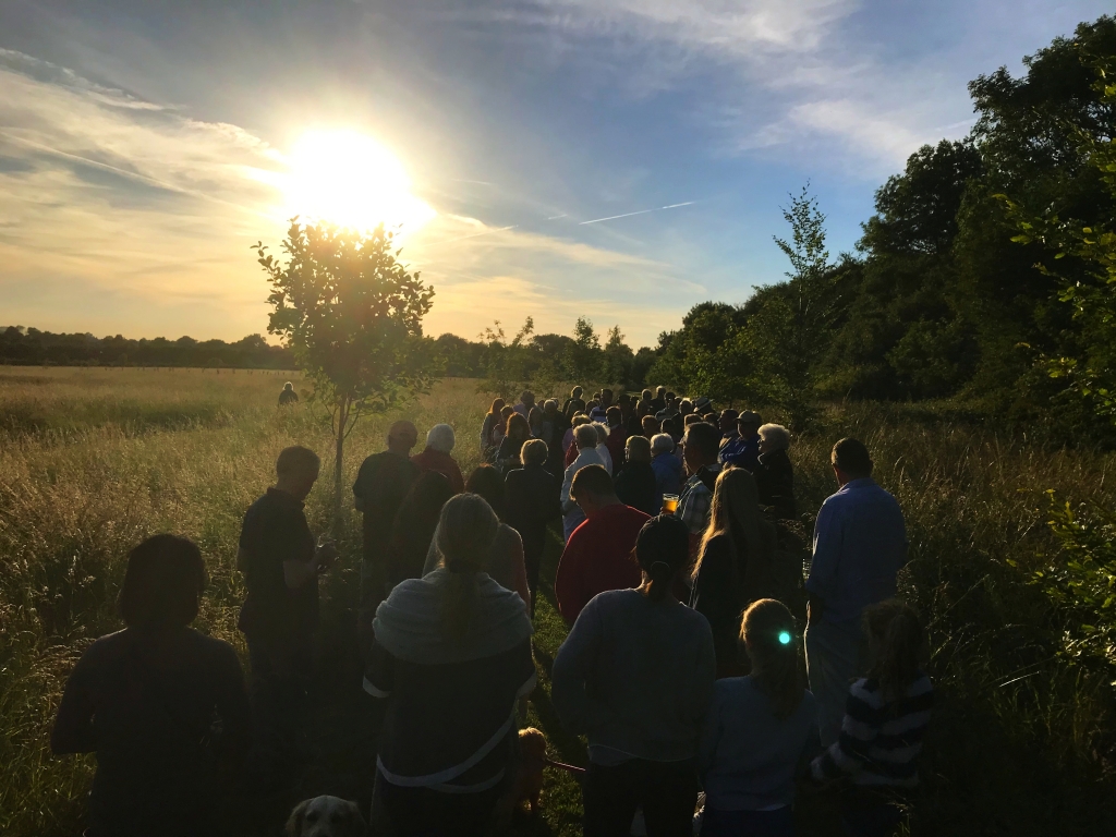 Gathering around the W.I. Tree to sing Jerusalem